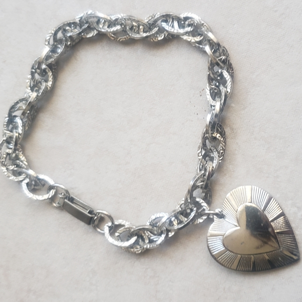 Vintage charm bracelet with heart charm
